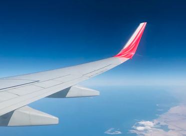 view of plane wing at altitude