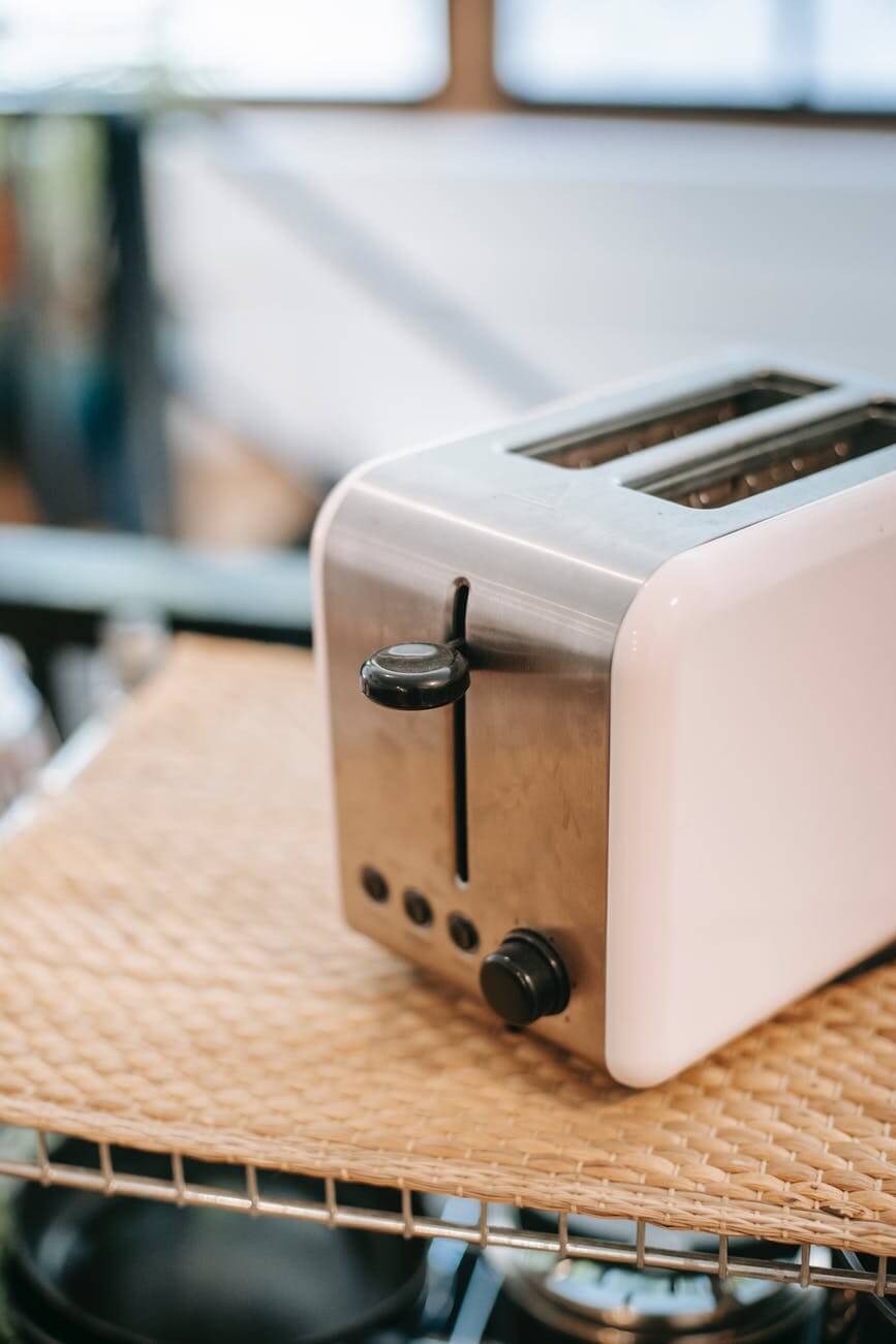 pexels photo 5825406 1 Modern toaster on shelf in kitchen