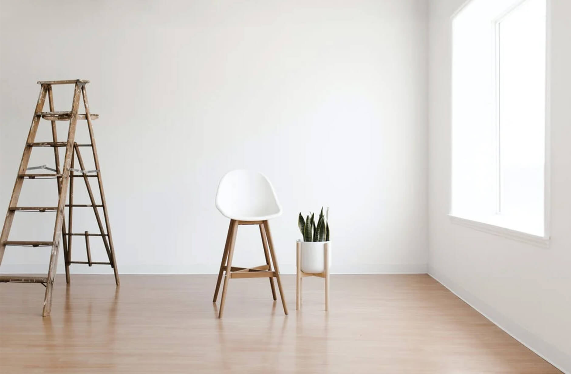 White Round Table Near White Wall