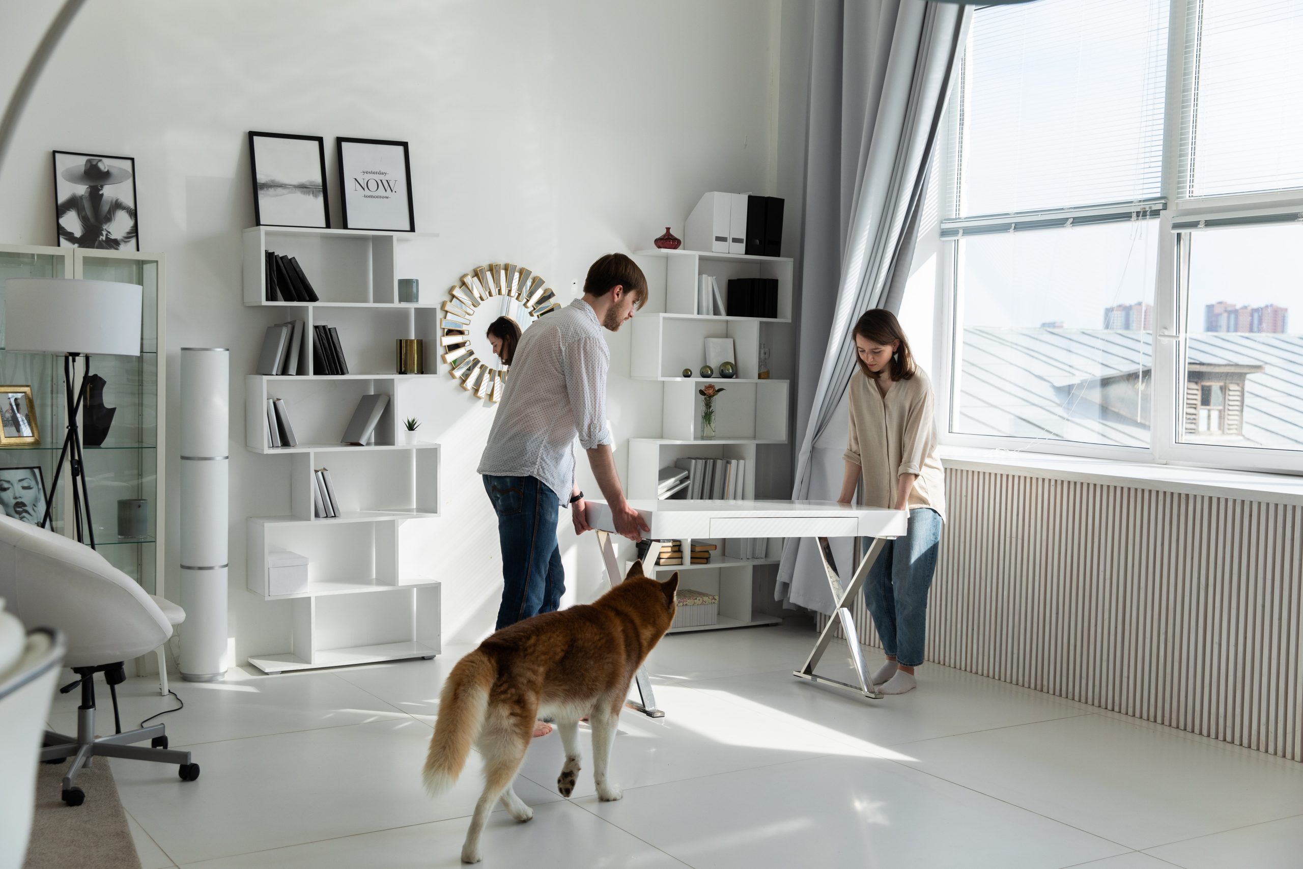 Couple Moving White Desk