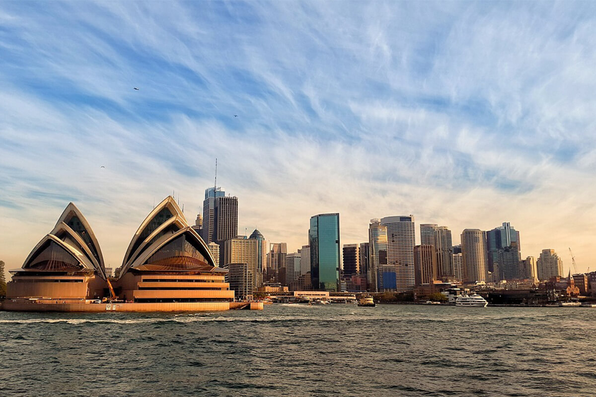 Sydney Opera house with other buildings at the back