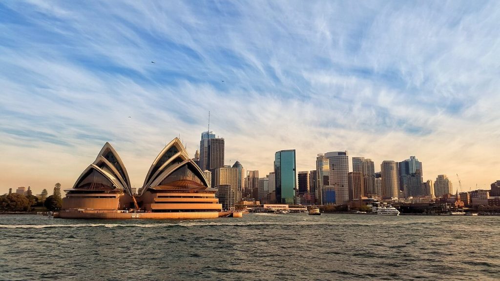 Sydney Opera house with other buildings at the back